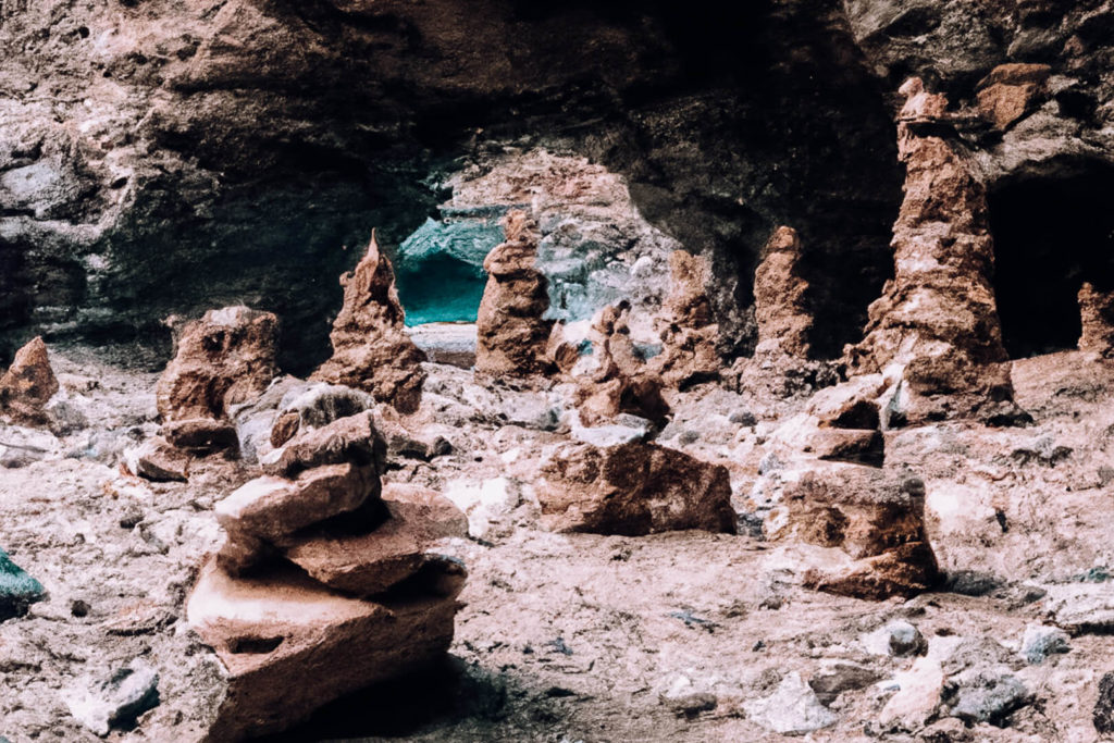 Cairns in cave at Tembeling beach